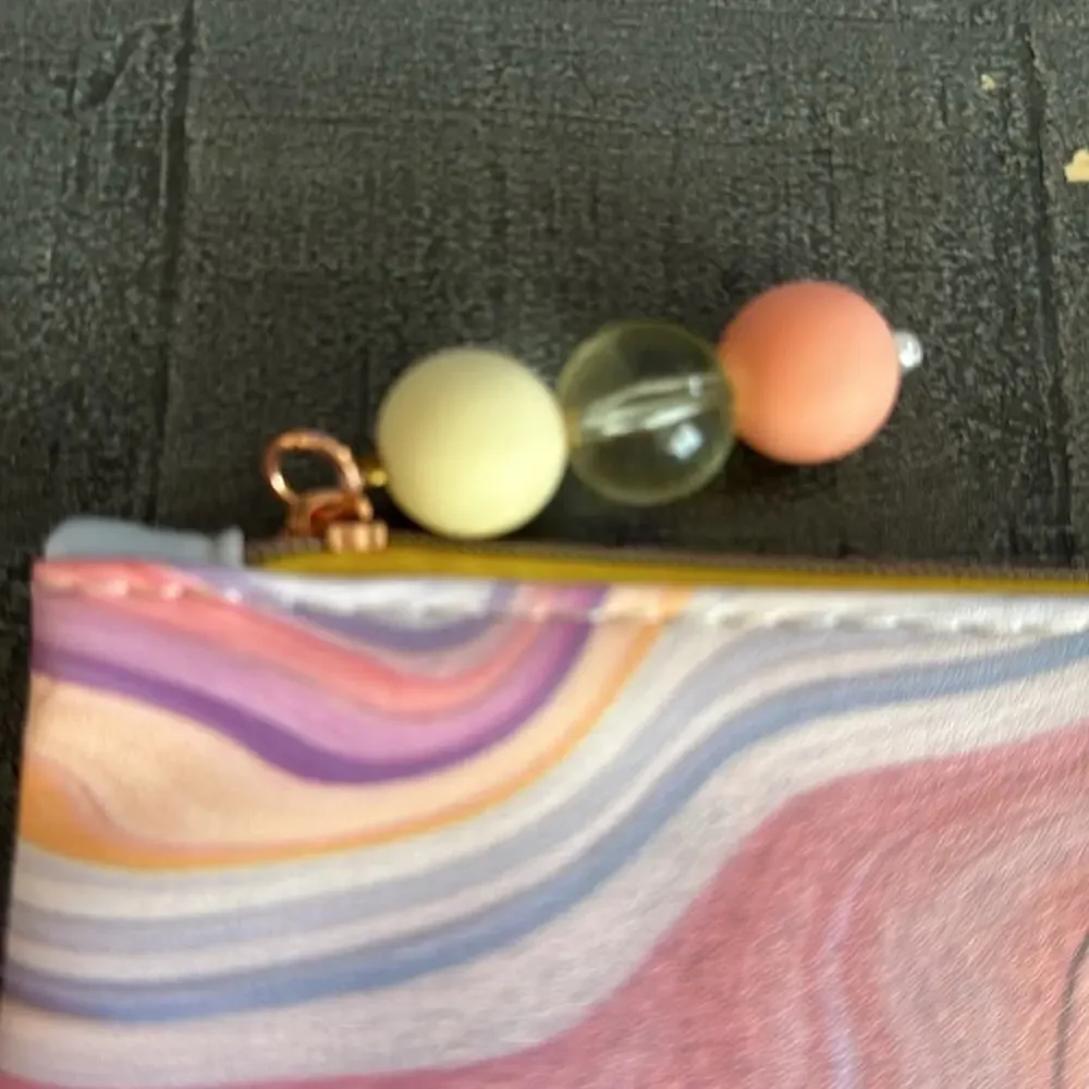 Ipsy March 2024 Swirl Soft Tones with Charm Zip Pull